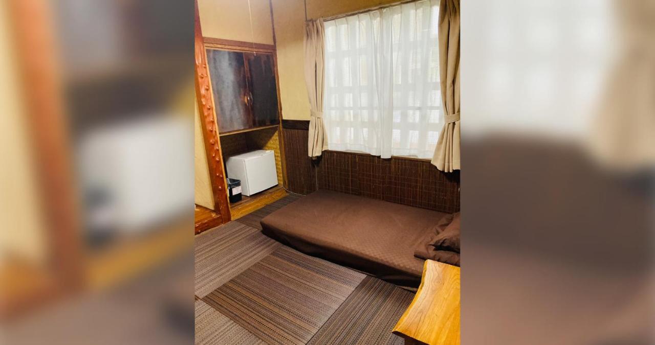 Hotel ペンションやいま日和 à Ishigaki  Extérieur photo