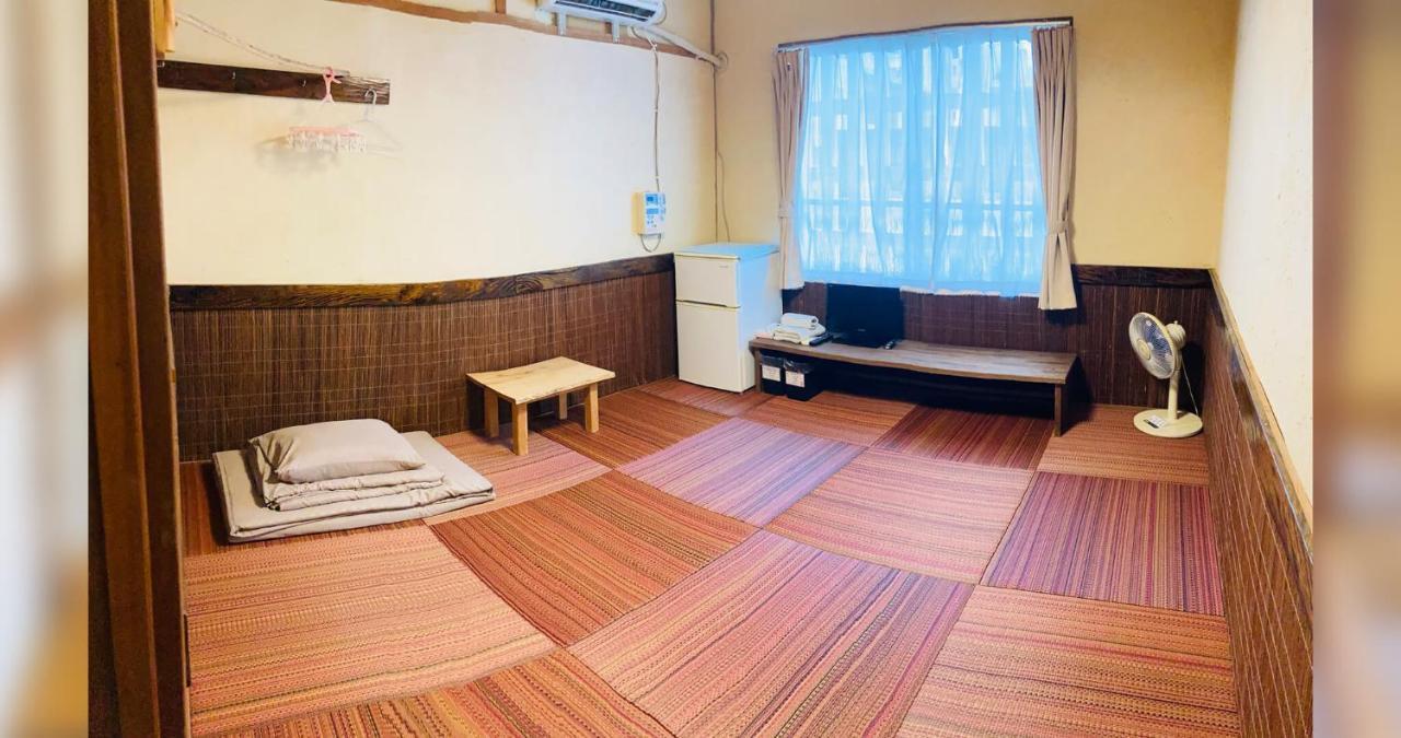 Hotel ペンションやいま日和 à Ishigaki  Extérieur photo