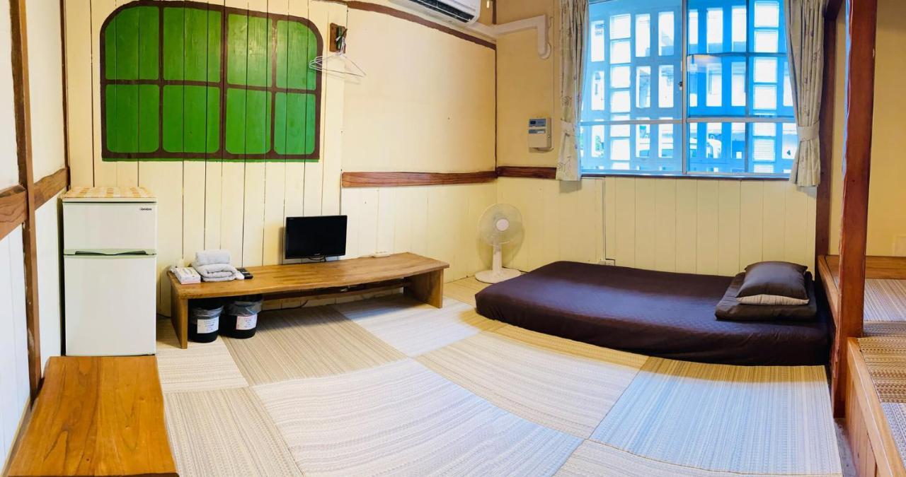 Hotel ペンションやいま日和 à Ishigaki  Extérieur photo