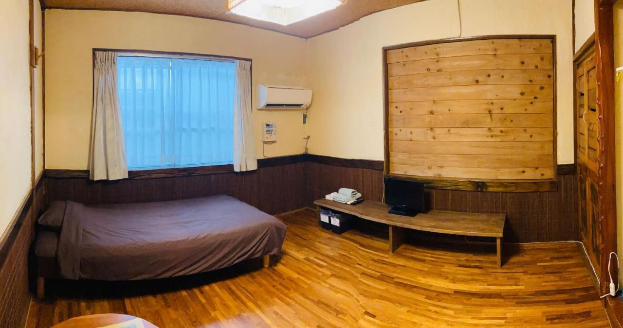 Hotel ペンションやいま日和 à Ishigaki  Extérieur photo