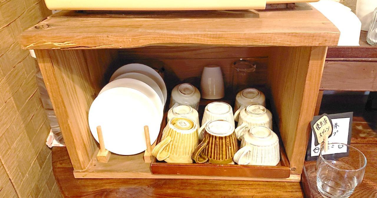 Hotel ペンションやいま日和 à Ishigaki  Extérieur photo